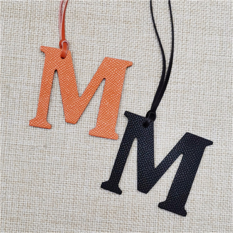 XMESSUN سلسلة مفاتيح جديدة بحر - مراجعة Monogram Keychain Leather وسعره