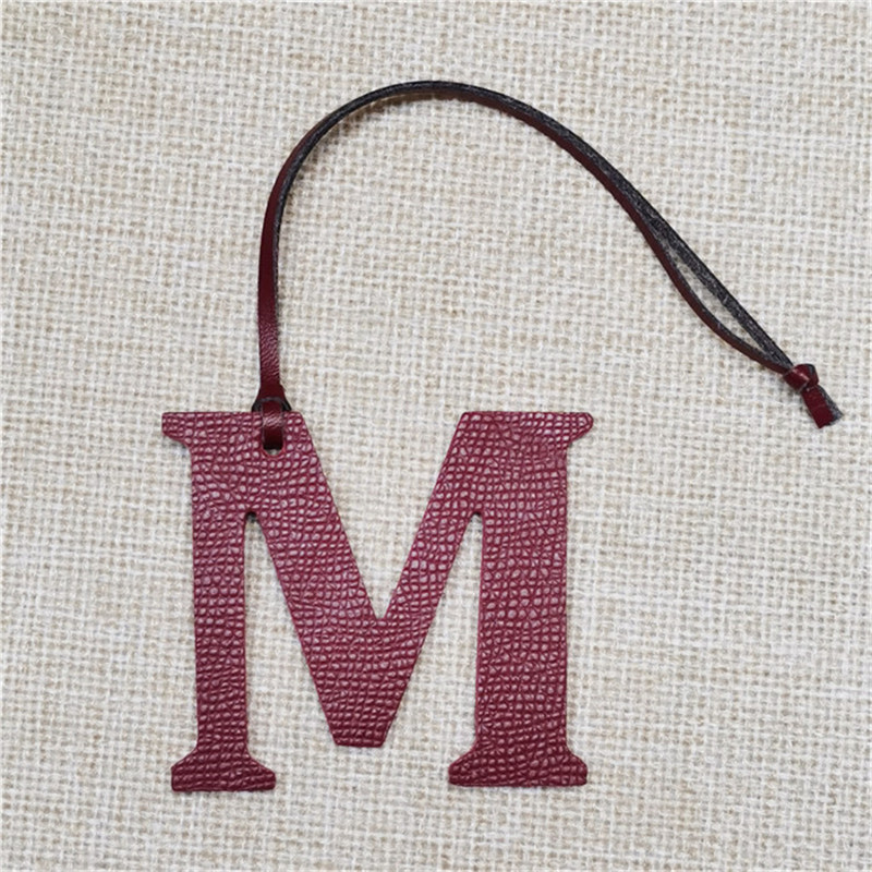 XMESSUN سلسلة مفاتيح جديدة بحر - مراجعة Monogram Keychain Leather وسعره