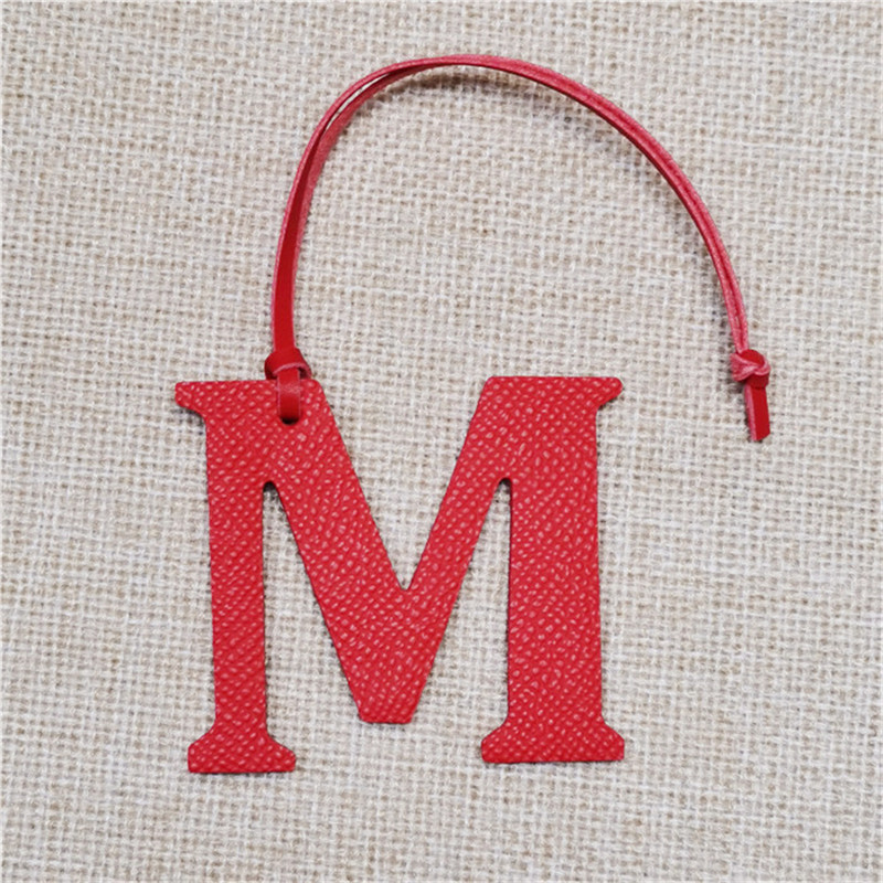 XMESSUN سلسلة مفاتيح جديدة بحر - مراجعة Monogram Keychain Leather وسعره